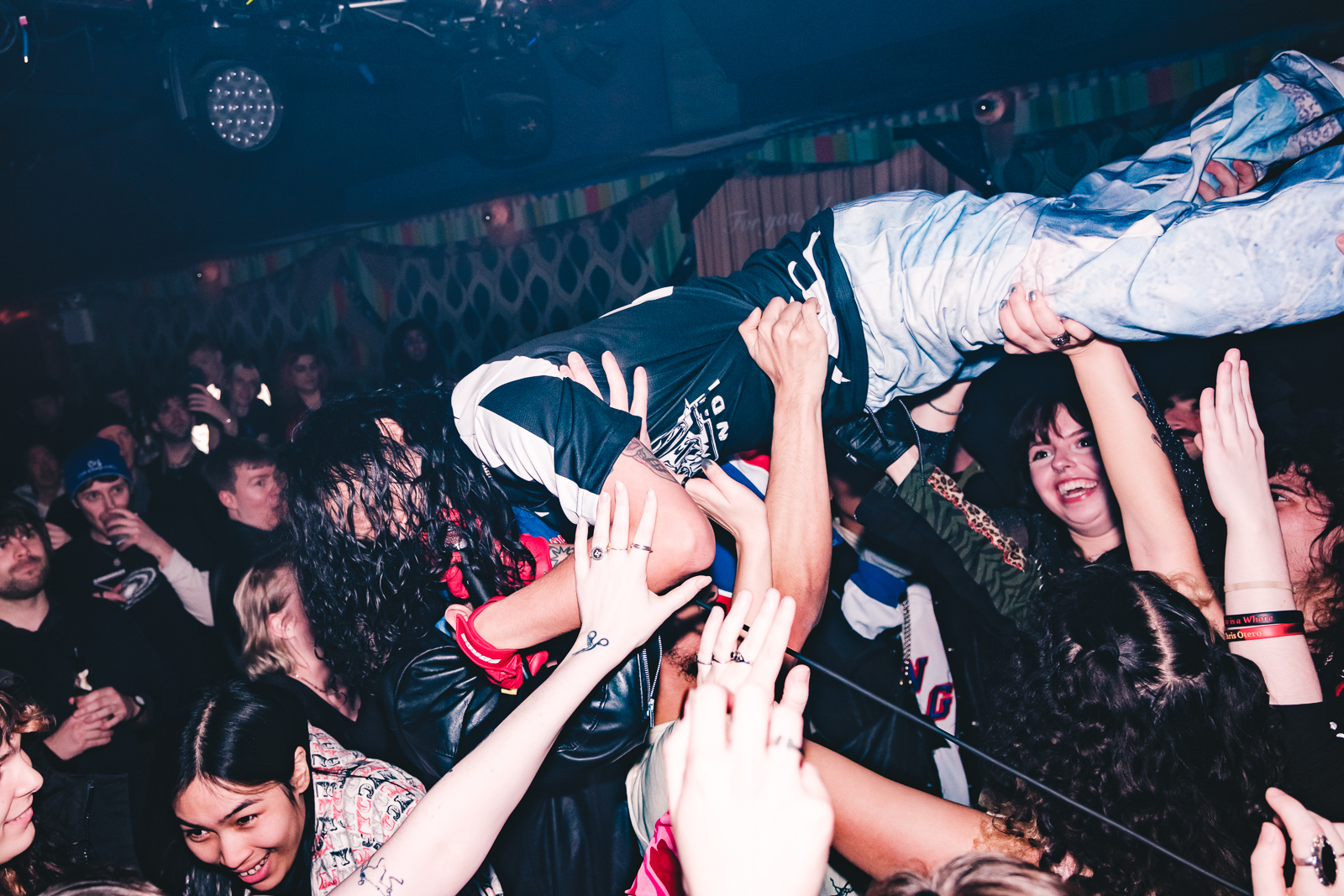 Promiseland crowd surfing during live performance